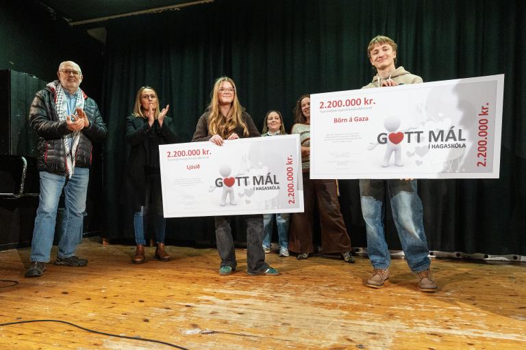 Students hand over the proceeds